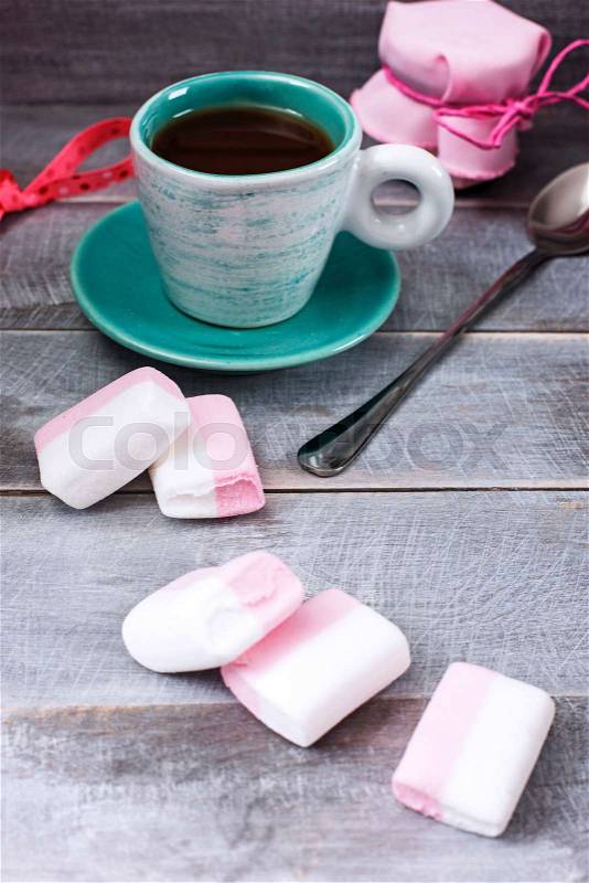 Сup of coffee, a jar of jam and marshmallows, stock photo