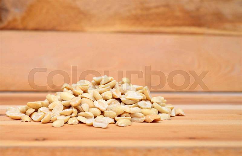 Peanuts on the wood background, stock photo