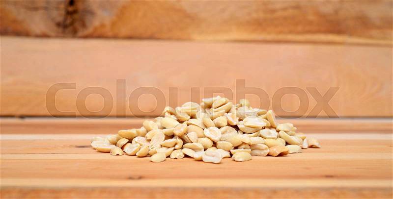 Peanuts on the wood background, stock photo