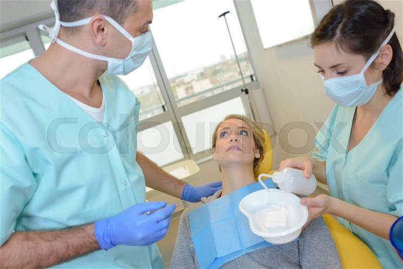 Woman in dentist\'s chair, stock photo