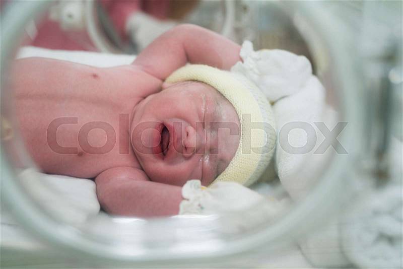 New born baby in hospiatal after delivery, Mon and babies concept, stock photo