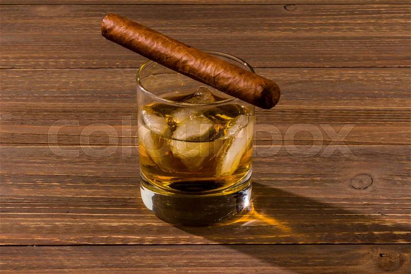 Cigar and whiskey. an icon photo for addiction and related, stock photo