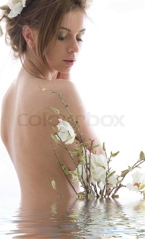 Picture of lovely woman with white flowers, stock photo