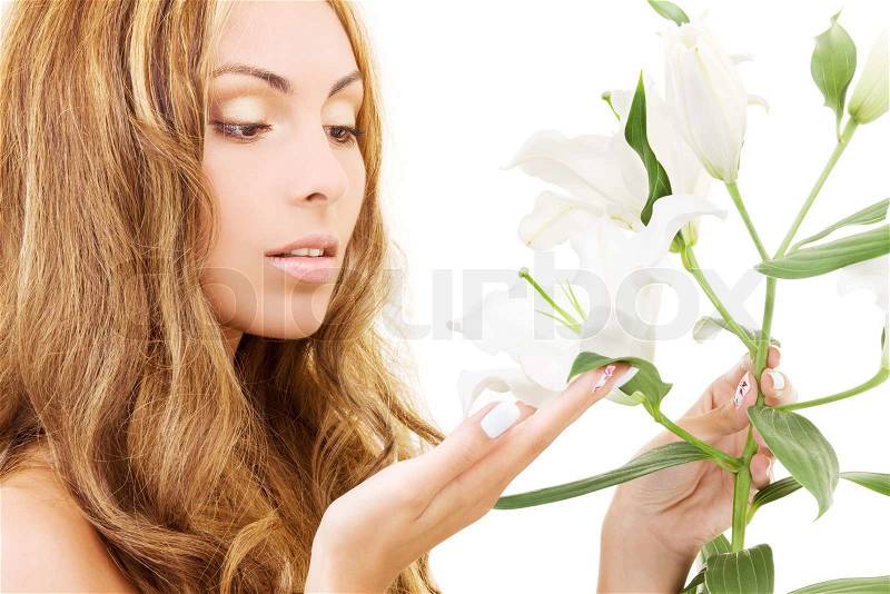 Lovely woman with white madonna lily flower, stock photo