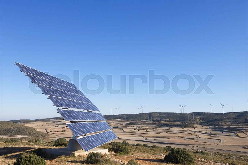 Sunrise over a field of solar electric production in Saragossa, Aragon, Spain, stock photo
