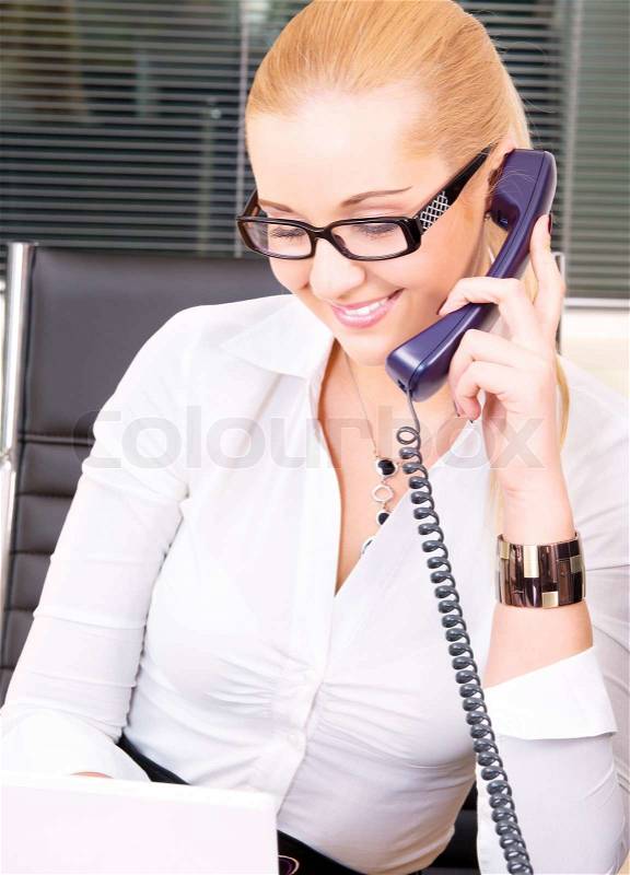 Picture of lovely girl with phone and notebook in office, stock photo
