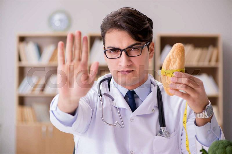 Doctor in dieting concept with fruits and vegetables, stock photo