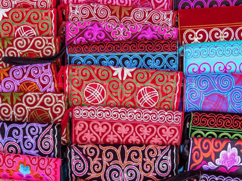 Traditional souvenirs - Kazakh ethnic handbags in street market in Almaty, Kazakhstan, stock photo