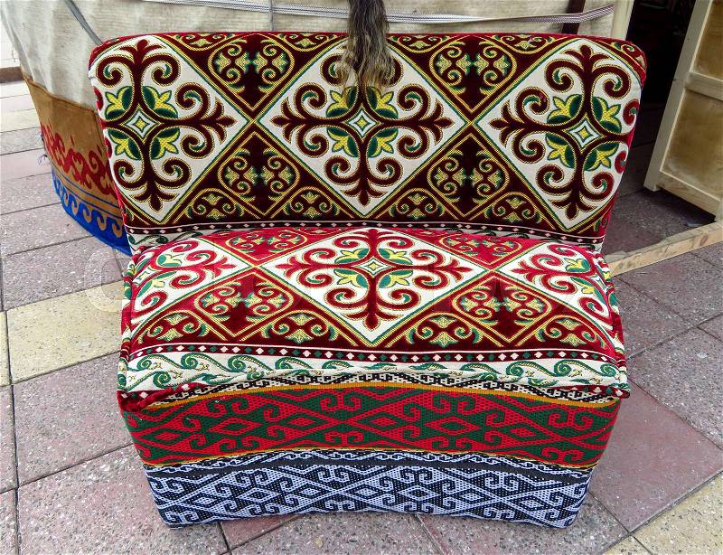 Kazakh ethnic sofa near yurt in Almaty, Kazakhstan, stock photo