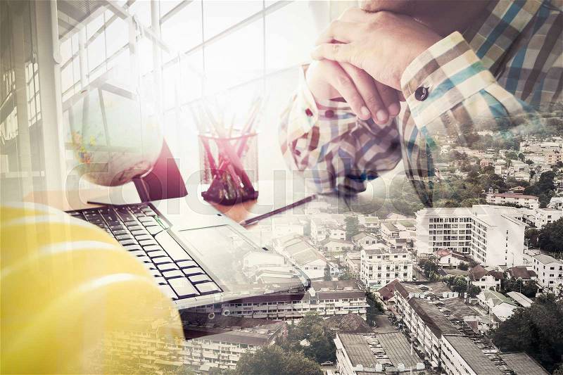 Double exposure of success land developer working in office with laptop, stock photo