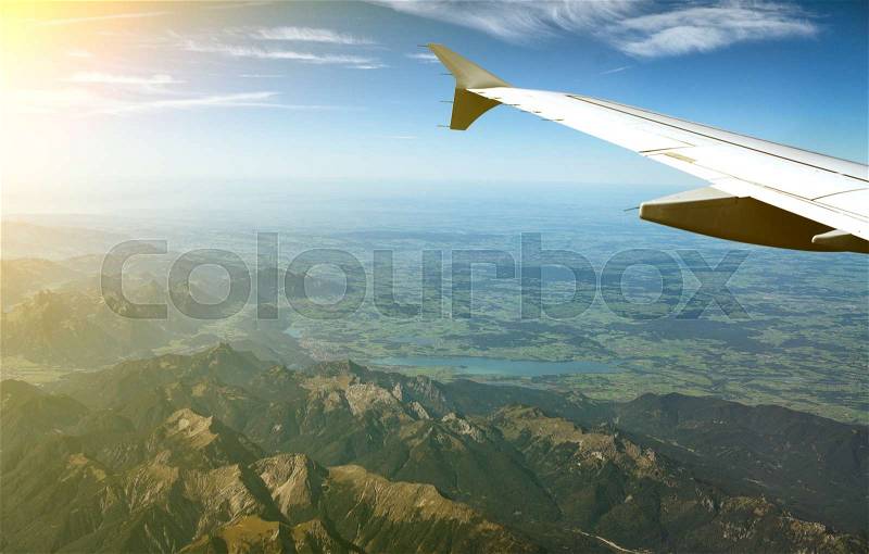 Wing of an airplane, view from window, stock photo