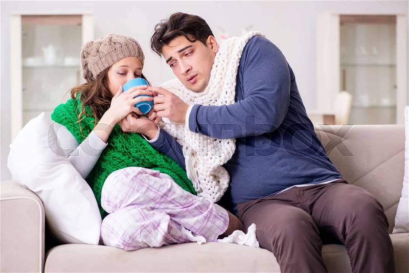 Sick wife and husband at home, stock photo