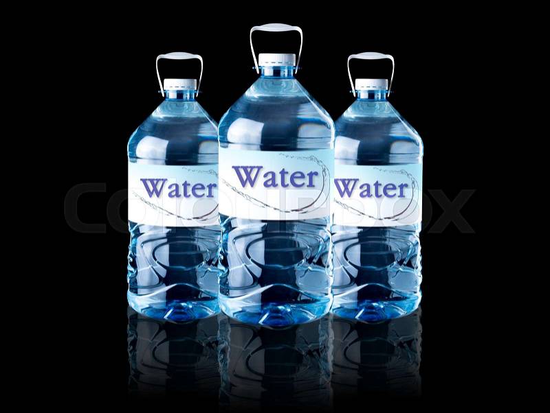 Big bottle of water with clean water isolated on black background, stock photo