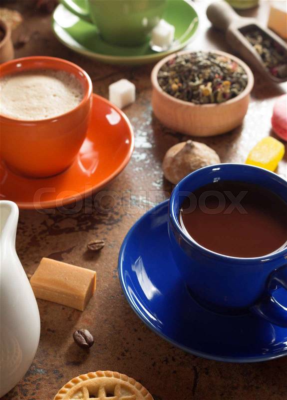 Cup of cacao and coffee at table surface, stock photo
