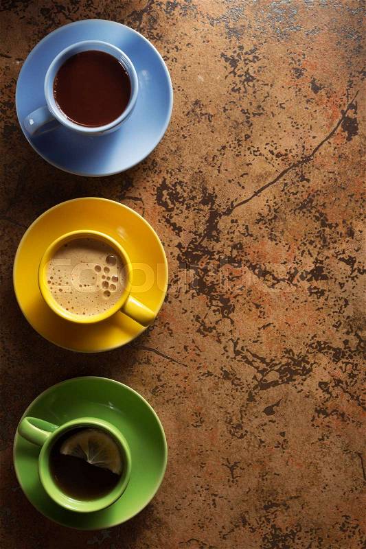 Cup of coffee, cacao and tea on table background, stock photo
