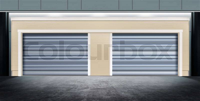 Modern closed garage with metal door on street of city at night time, stock photo