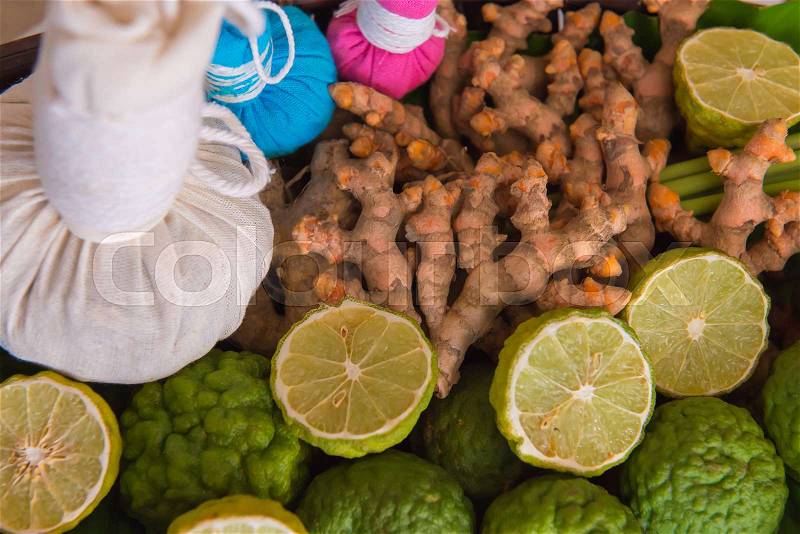 Herbal spa balls for treatment or massage with herb bergamot and ginger, stock photo