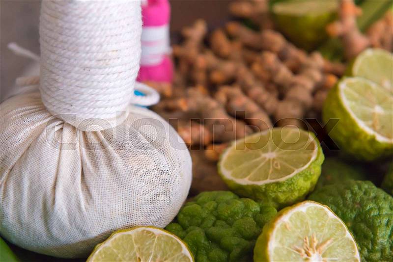 Herbal spa balls for treatment or massage with herb bergamot and ginger, stock photo