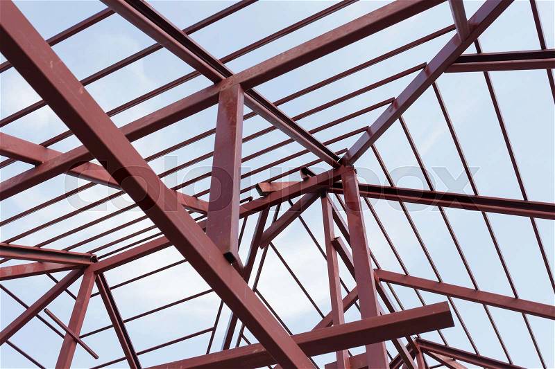 Structural steel beam on roof of building residential construction, stock photo