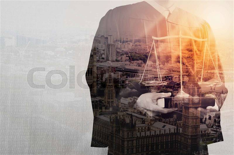 Double exposure of justice and law concept.Male judge in a courtroom with the balance scale and holy book,London city , stock photo