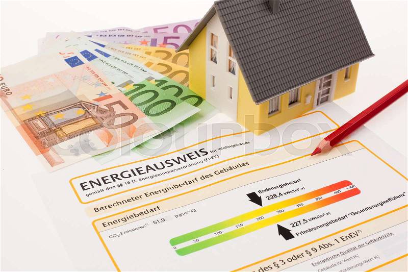 The energy performance certificate for single family, austria. model house and red pen, stock photo