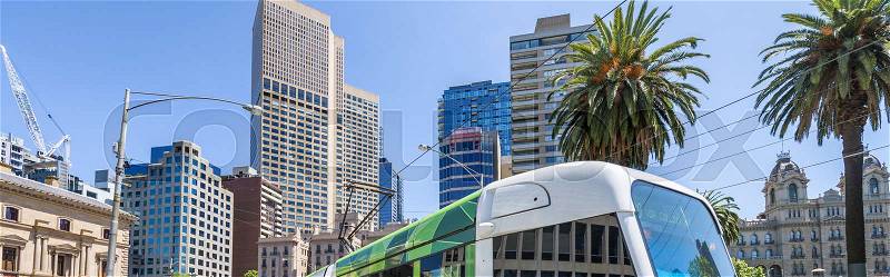 Tram and buildings of Melbourne, Australia, stock photo