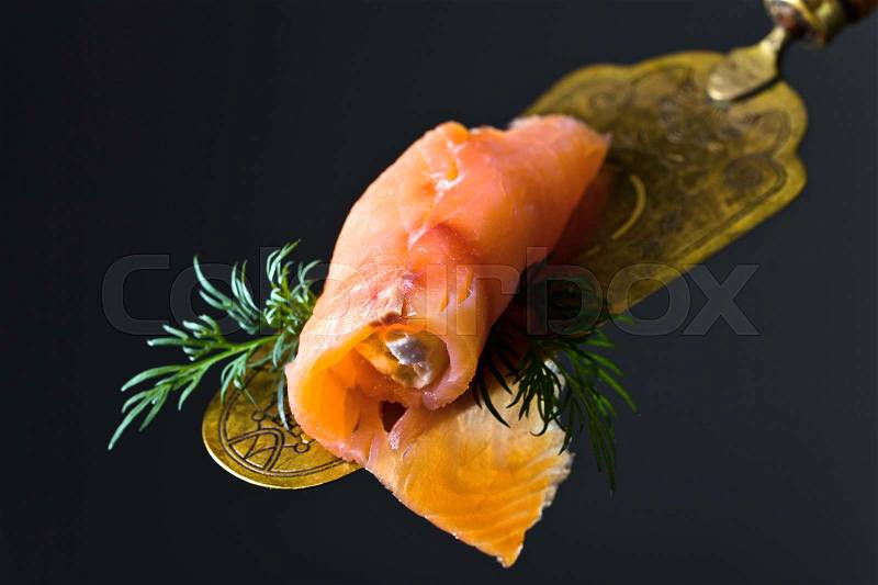 Smoked salmon or trout , cream cheese and dill . Tasty snack. Seafood, stock photo