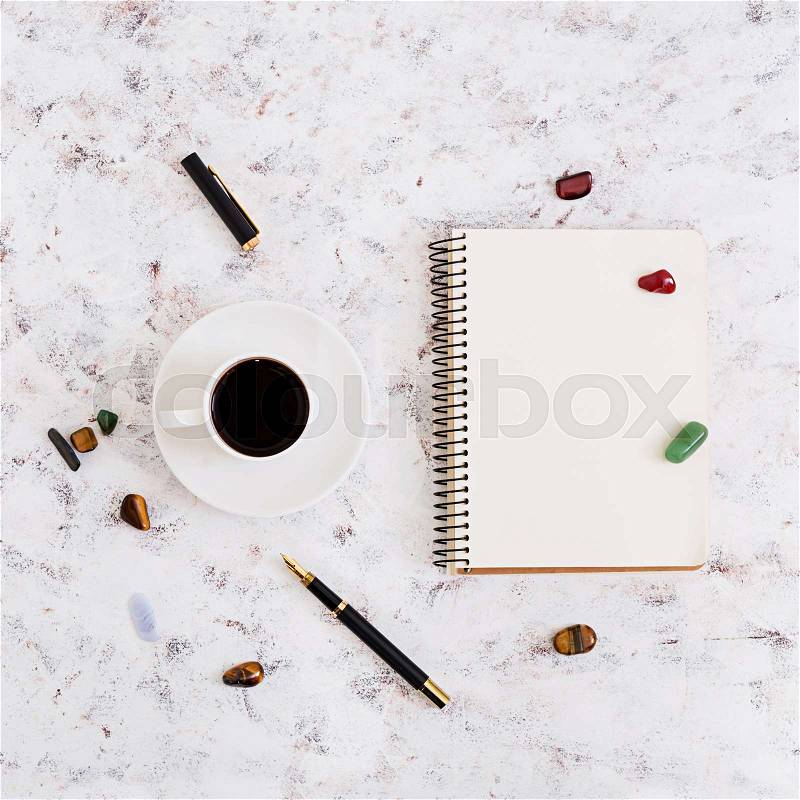 Flat lay, top view office table desk. Desk workspace with diary, pen, cup of coffee on white background, stock photo