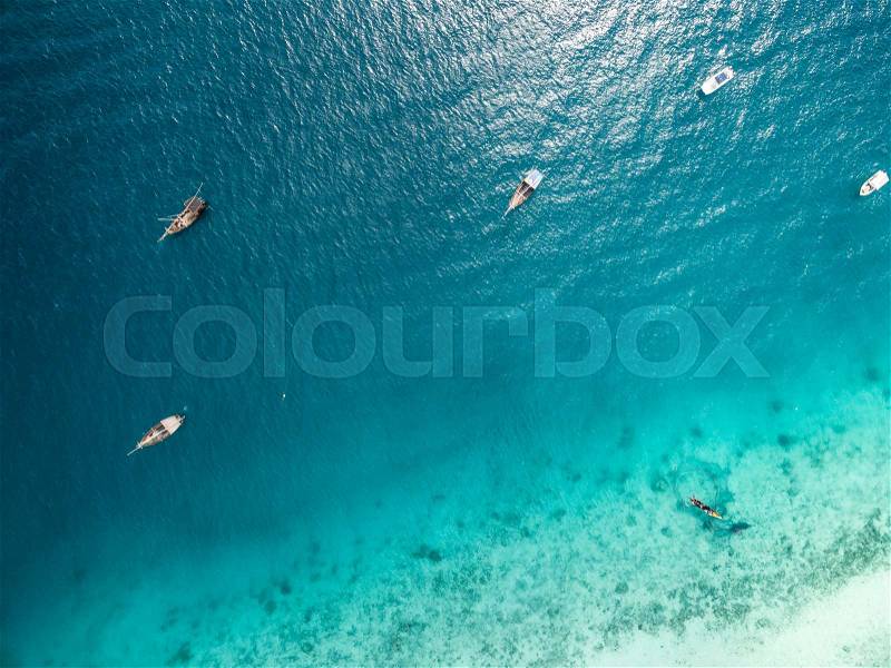 Beautiful blue ocean with boats top view aerial photo, stock photo