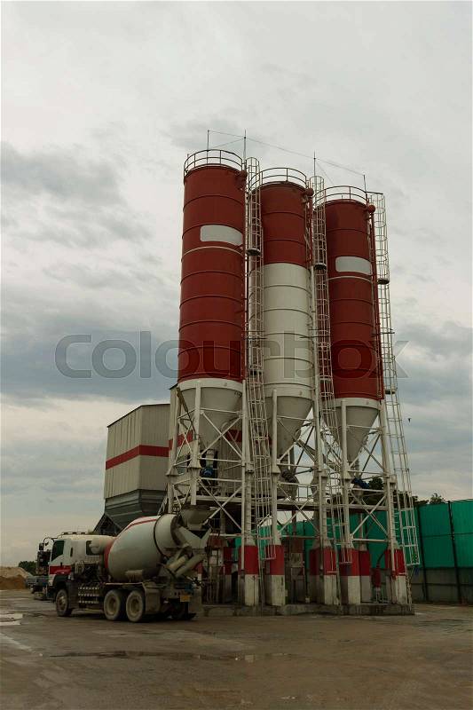 A concrete batching plant for ready-mix concrete truck, stock photo