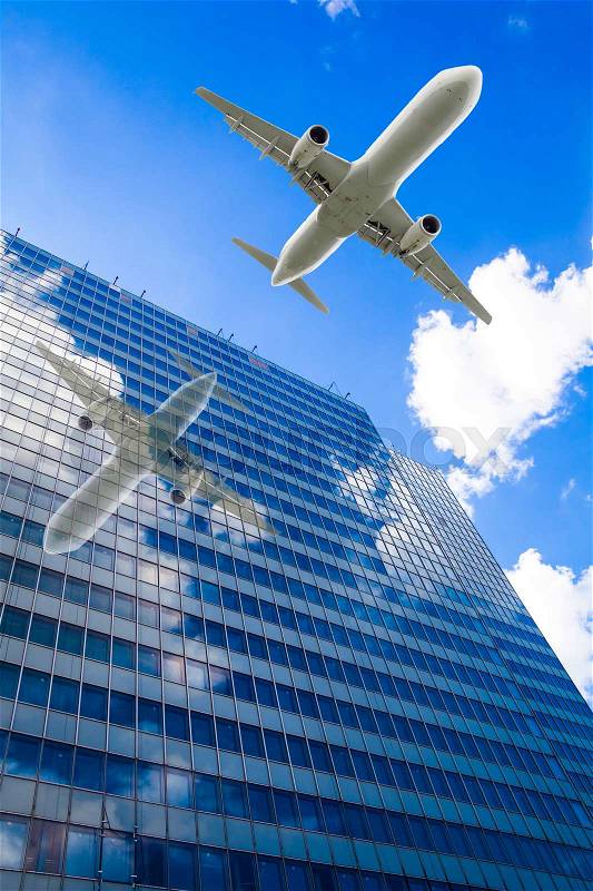 Aeroplane flying over the skyscrapers. architecture building with flying airplane, stock photo