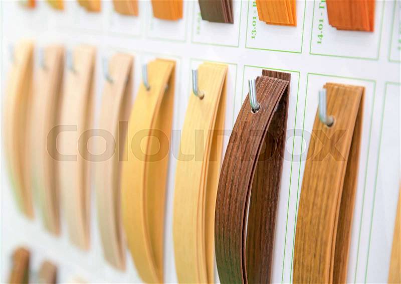 Wooden veneer samples palette closeup. Interline texture catalog. Face line wood decoration, stock photo
