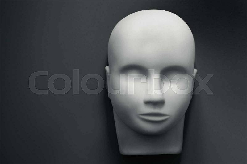 Empty human mannequin head with realistic skin on texture. top view, stock photo
