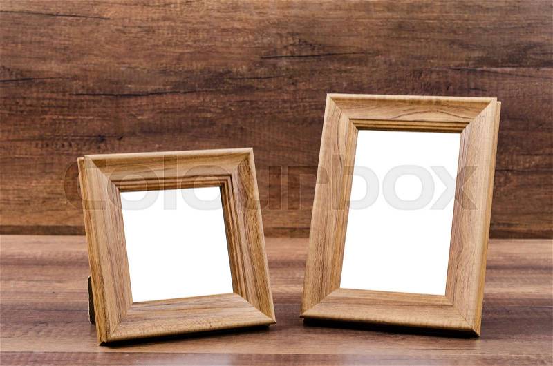 Wooden frame on wooden background, Save clipping path, stock photo