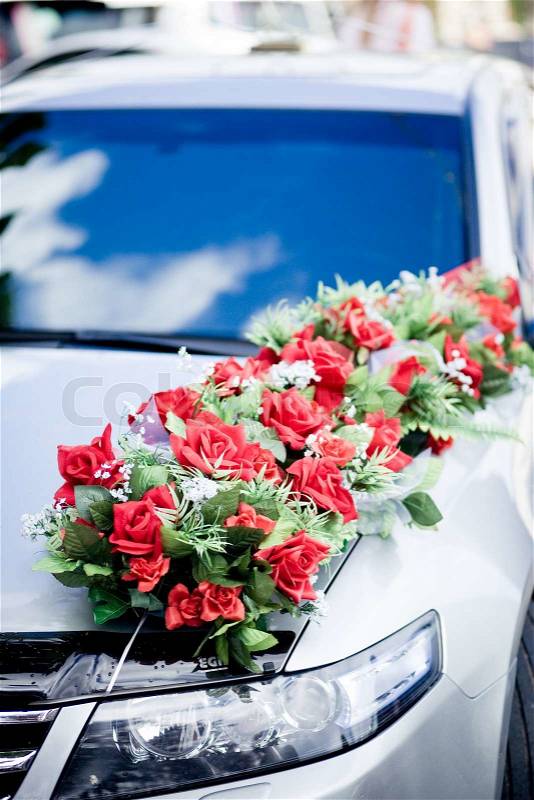 Wedding car decoration by bunch of roses, stock photo