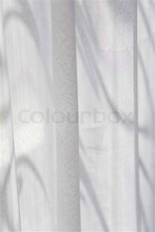 Part of white window curtain lighting through, stock photo