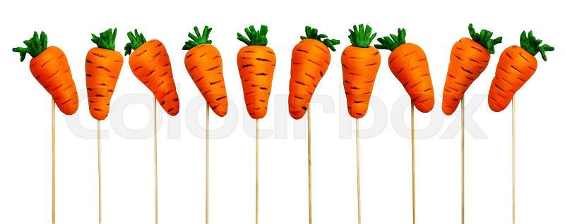 Easter carrots on a stick, isolated on a white background, stock photo