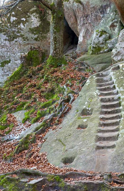 Stairs are intagliated in a rock upwards, stock photo