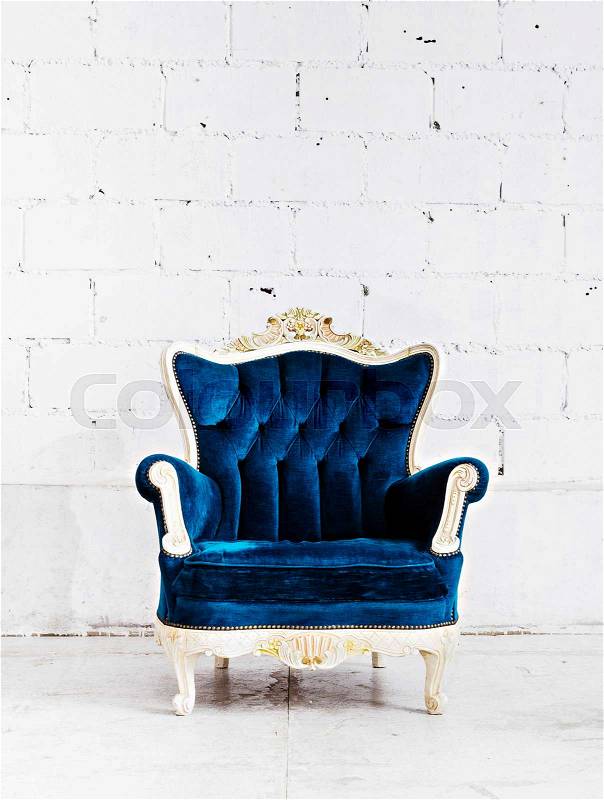 Blue classical style Armchair sofa couch in vintage room, stock photo