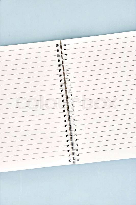 A close up shot of a notebook writing pad, stock photo
