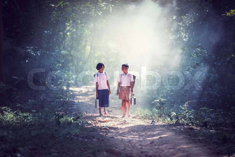 Student little asian boy and girl, countryside in Thailand, stock photo