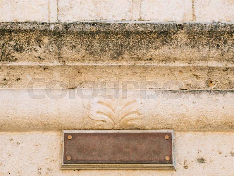 Board for inscriptions on the wall of a building in Montenegro, stock photo