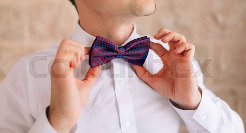 The bow tie. Close the frame. Male chin with bow tie, stock photo