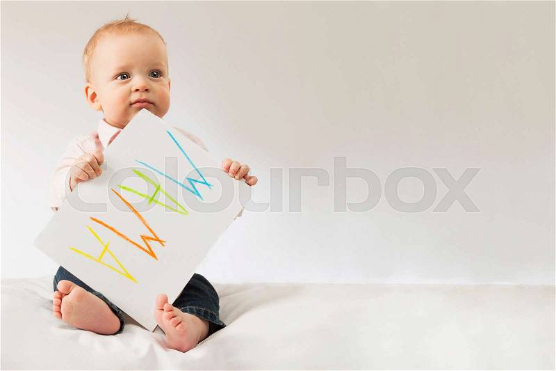 Funny boy holding greeting poster for Mothers day. Copy space, stock photo