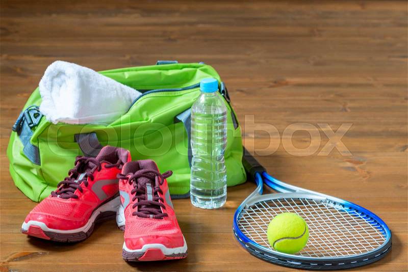 Set of sports facilities for playing tennis on the floor, stock photo