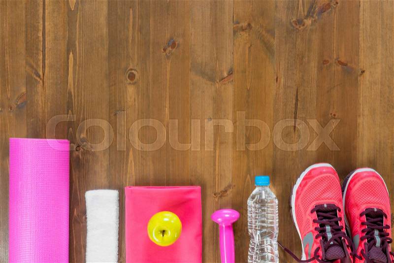 Dark wood floors and facilities for sports at the bottom of the frame, stock photo