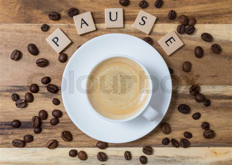 Espresso Pause with coffee beans letter concept, stock photo
