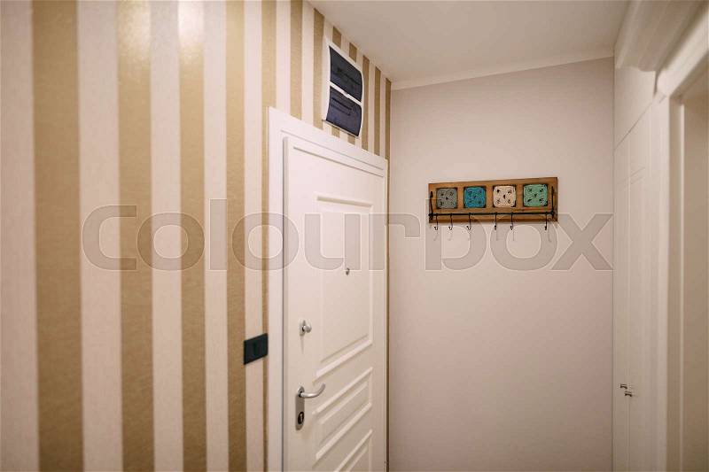 The front door to the apartment in hotel, stock photo