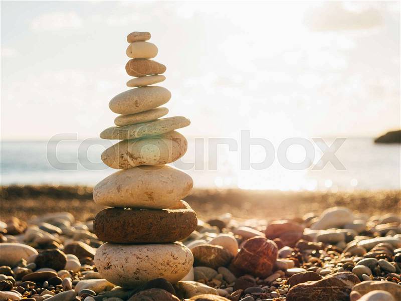 Balance stones on the beach. Peace of mind. Equilibrium life. Calming nerves, stock photo