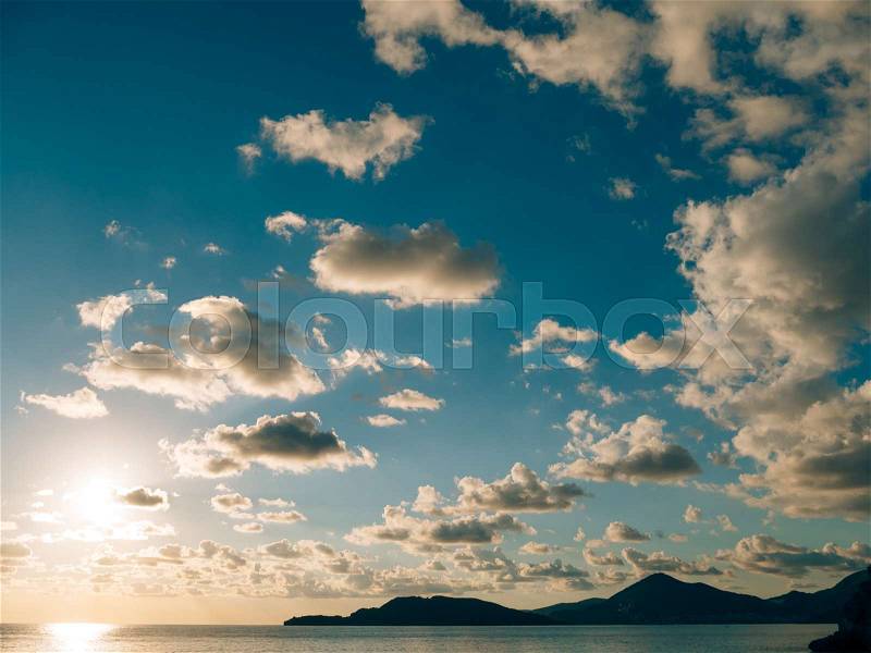 Sunset over the sea. Sunset over the Adriatic Sea. Sun to sit down in the water, stock photo